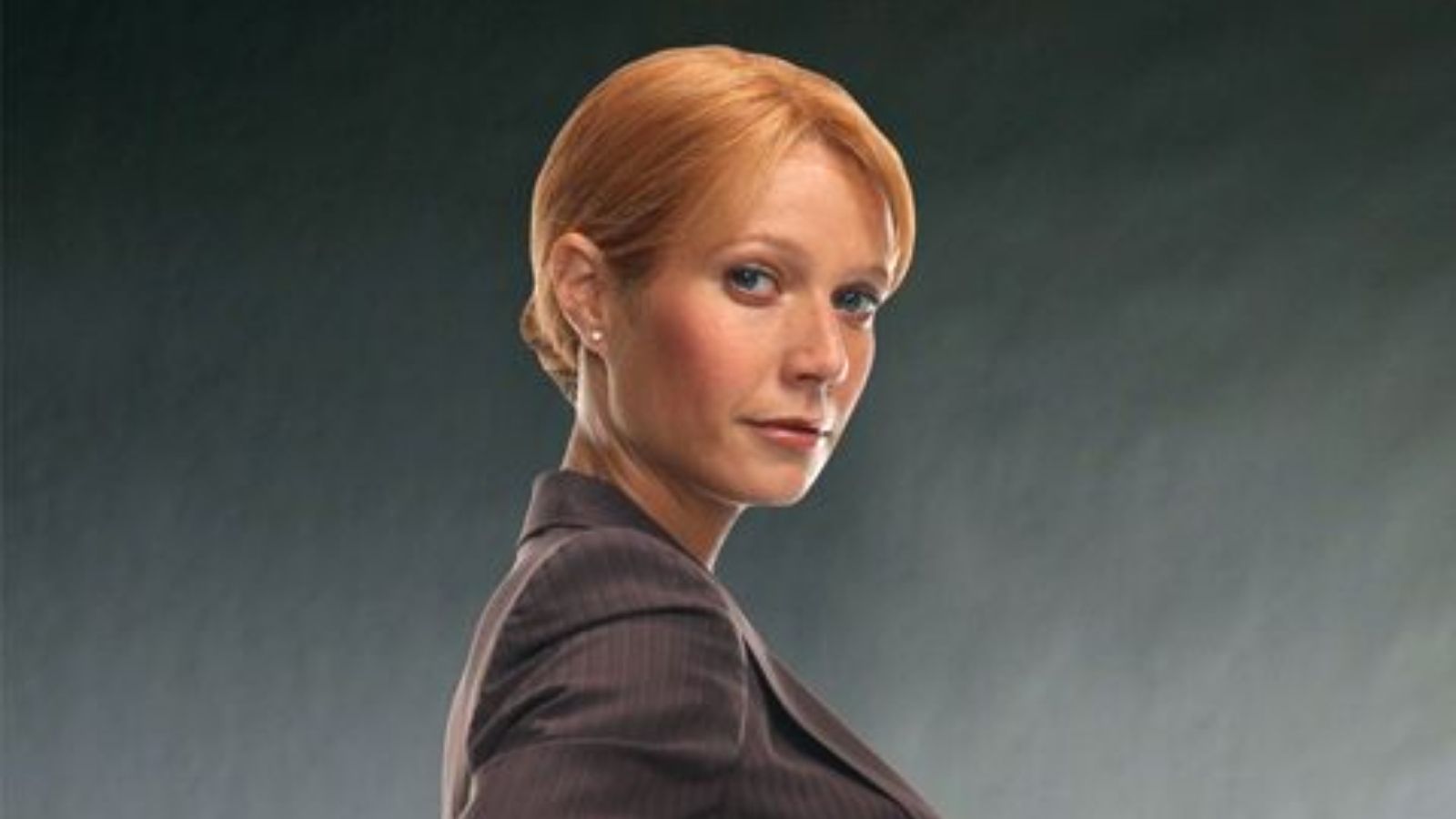 a red hair ginger white woman in a suit - Pepper Potts