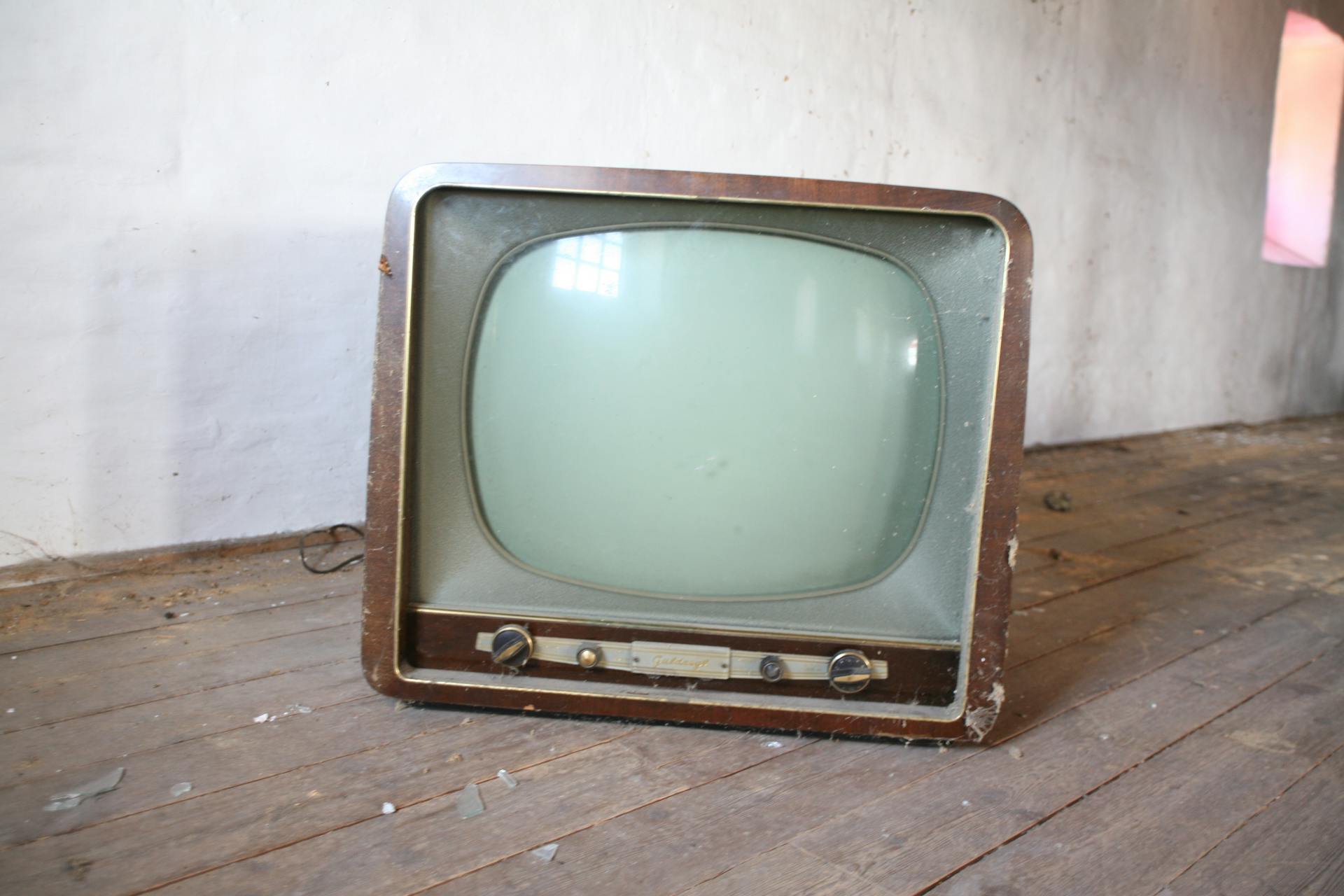 Chapter 20 Comfort In The Ordinary And old vintage tv sitting on the floor.