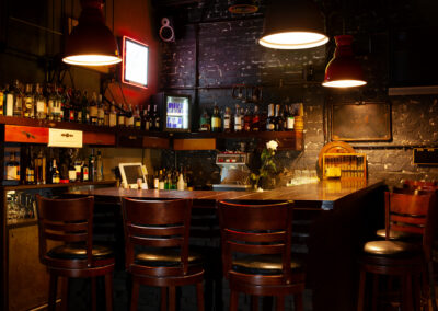 an image of a dark dive bar/
