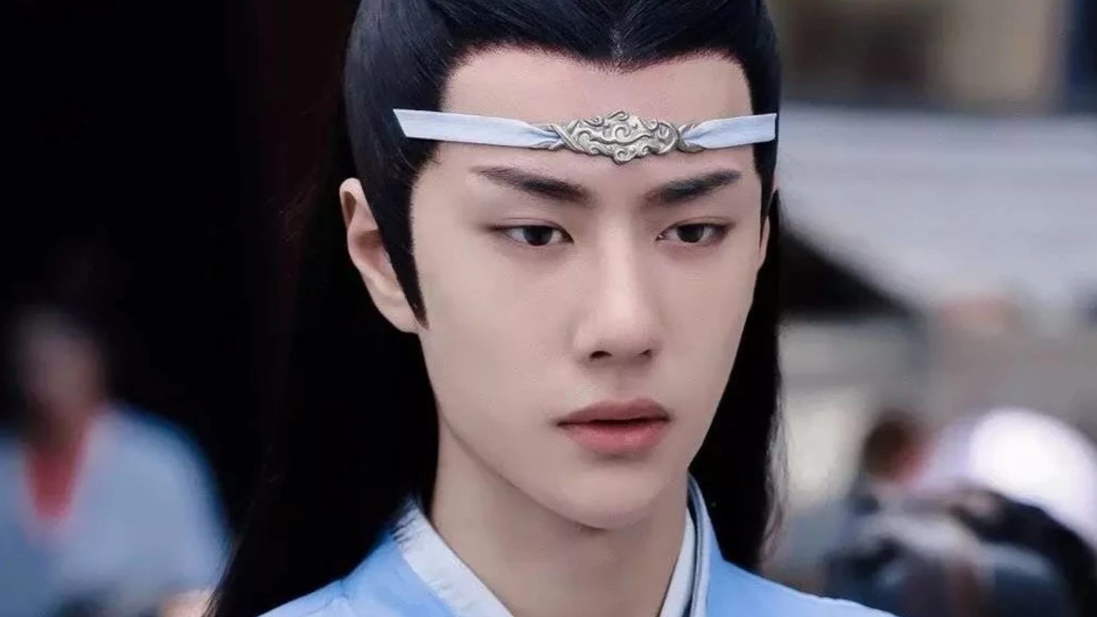 Lan Wangji - A Pretty Chinese Man in a blue robe and a cloud headband.
