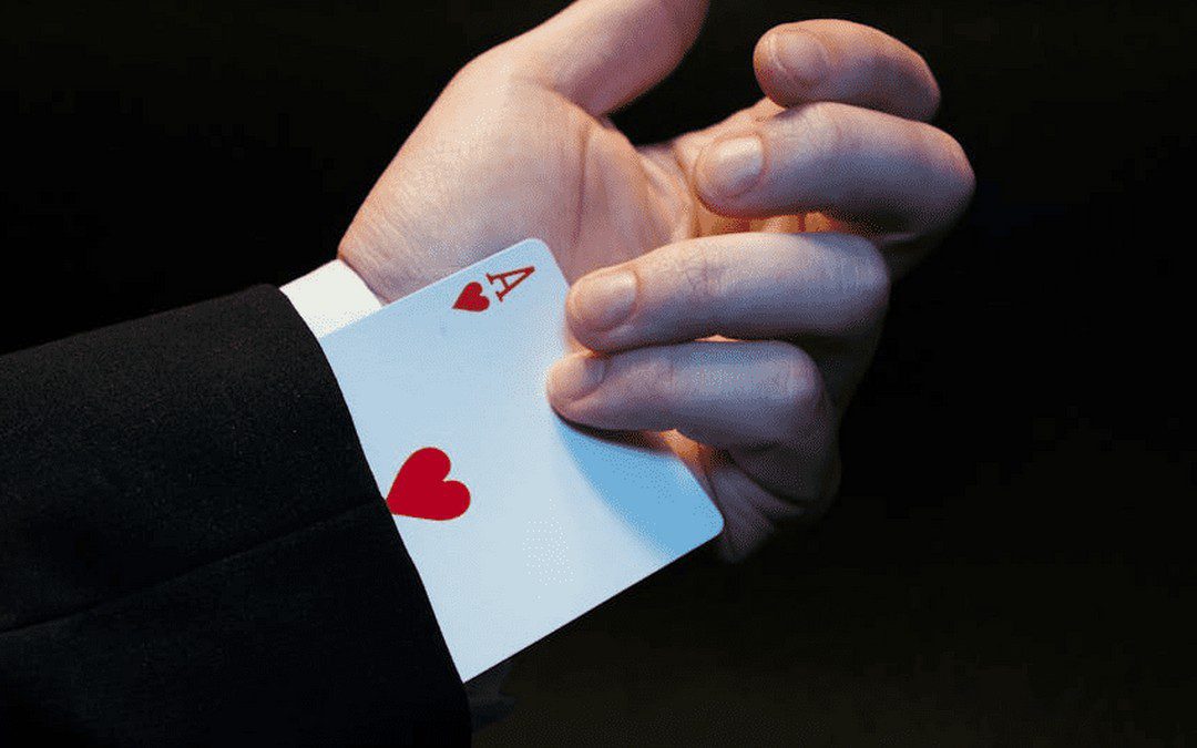 an image of a man with a magician with a ace up his sleeve