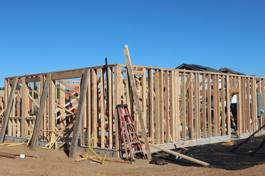 an image of a the frame of house being built.